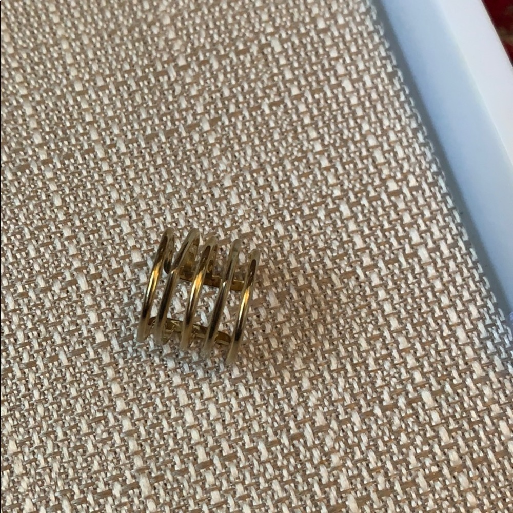 Gold adjustable ring.